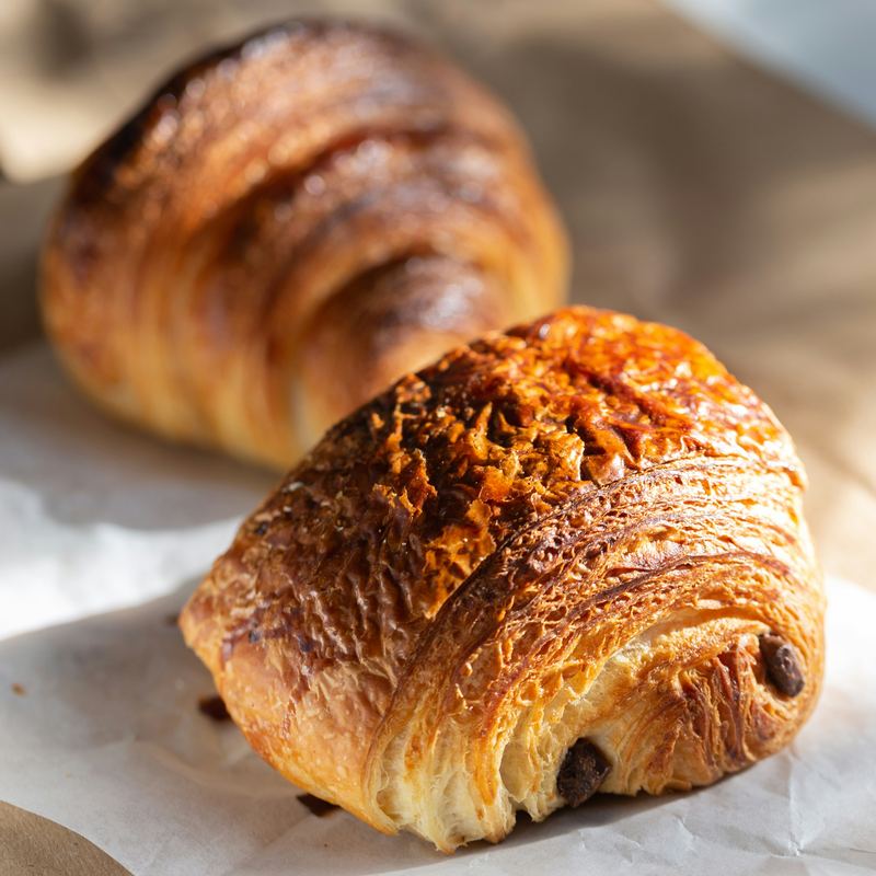 A rectangular pain au chocolat with visible flaky layers