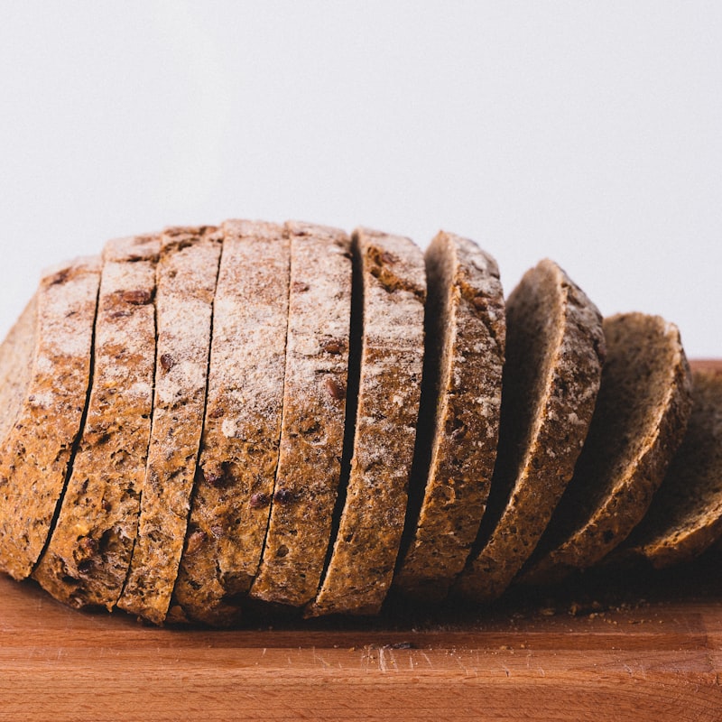 A large rustic country boule dusted with flour